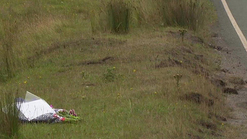 flowers at scene of crash