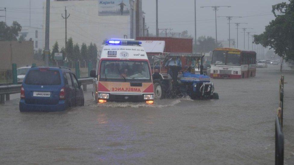 A view of waterlogged NH 56 after heavy rains on September 16, 2021 in Lucknow, India. Continuous heavy rain on Thursday threw life out of gear in Lucknow and exposed the tall claims of the municipal corporation.