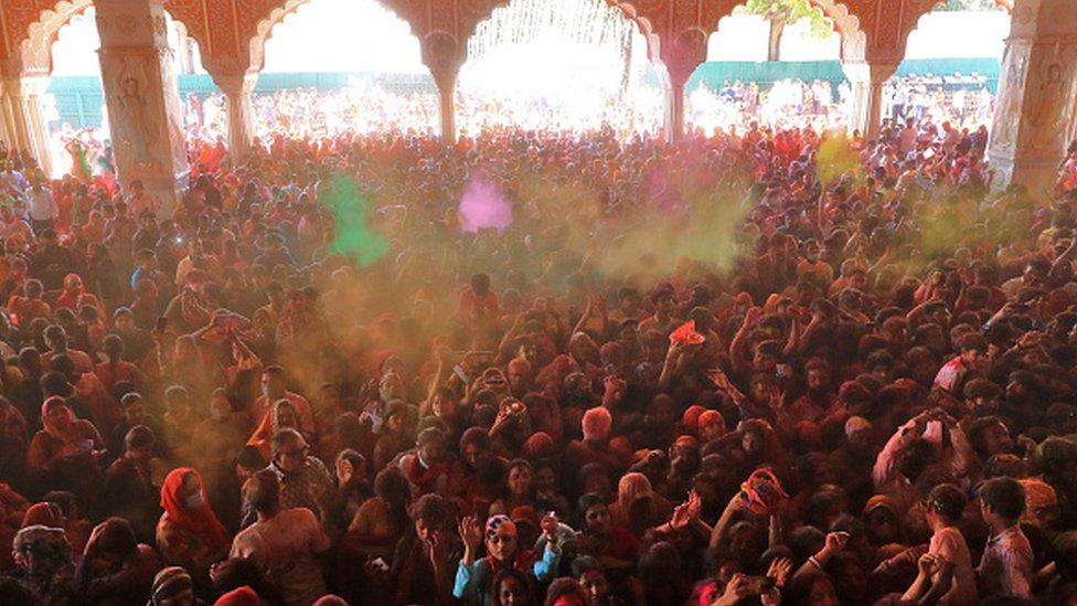 A street stall selling colours on the eve of Holi festival, at Sadar Bazaar on March 17, 2022 in Gurugram, India