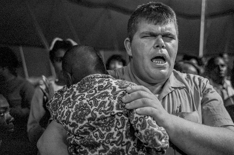 A Pentecostal revival held inside a tent built on the historically black Nelson Street in Greenville, Mississippi, 1969