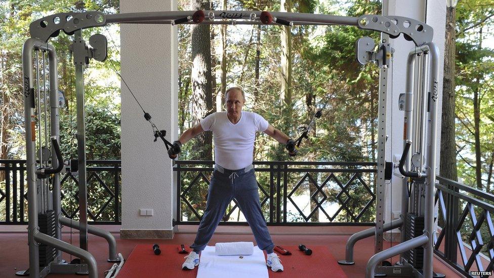 Russian President Vladimir Putin exercises in a gym at the Bocharov Ruchei state residence in Sochi, Russia, August 30, 2015