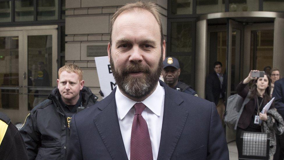 Rick Gates (C) leaves court in Washington DC on 23 February 2018