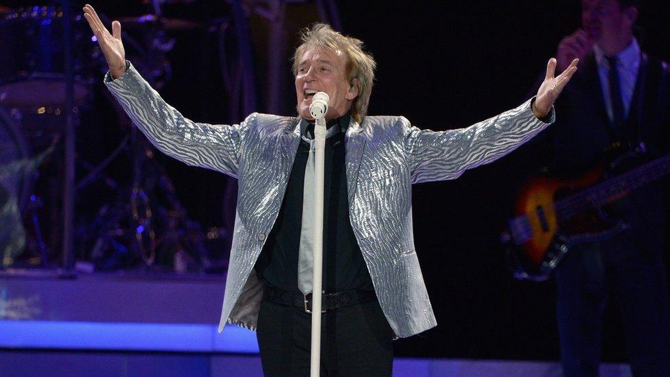 Sir Rod Stewart performing