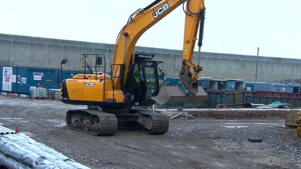 JCB OPERATOR WORKS AT NEW WING CONSTRUCTION