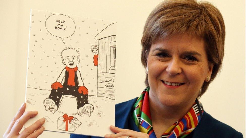 Nicola Sturgeon and card