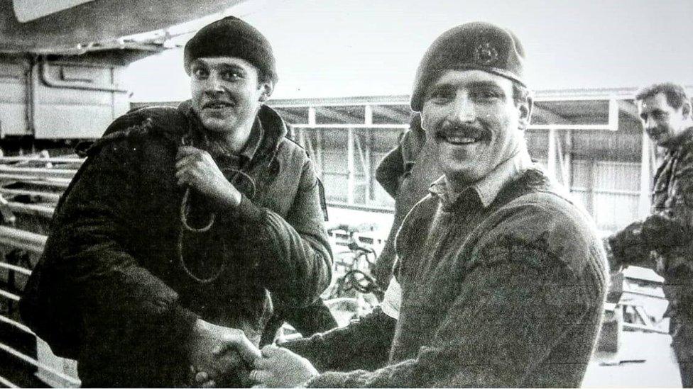 Giorgio Podesta (left) leaving the SS Canberra at Puerto Madryn