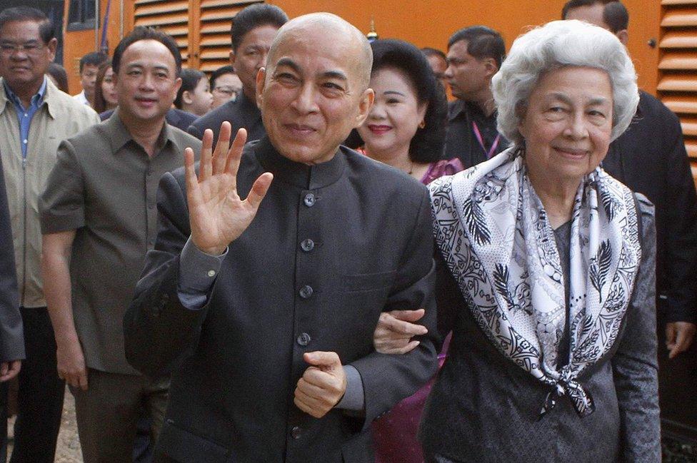 Cambodia's King Norodom Sihamoni and his mother, former queen Monique, at the railway station in Phnom Penh on December 30, 2016.