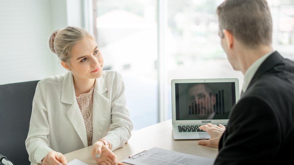 Employees in meeting