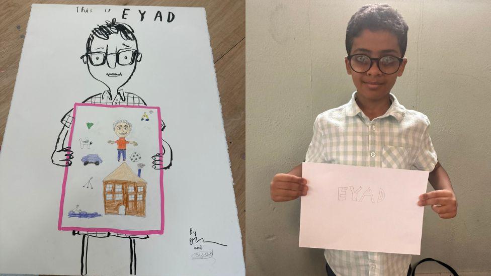 Eyad and Oliver Jeffers drawing of Eyad holding his own drawing