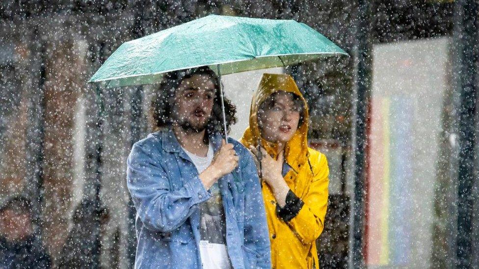 Couple under umbrella