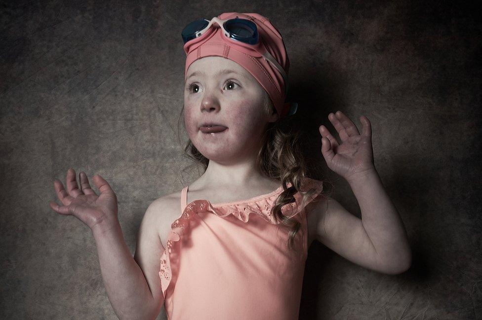 Luna, a girl from Consett, in a pink swimming costume