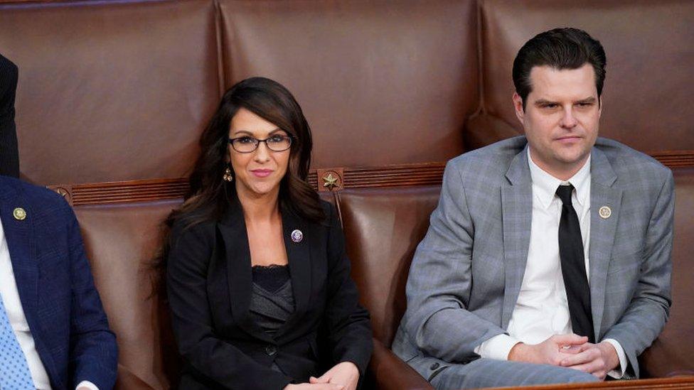 Matt Gaetz and Lauren Boebert sit together