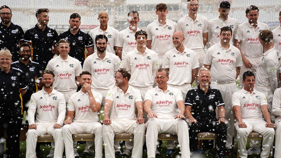 Nottinghamshire CCC pose for a team photograph as snow falls during a photocall at Trent Bridge, Nottingham