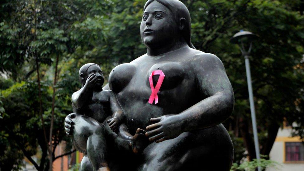 Botero statue wearing a pink bow as part of a breast cancer awareness campaign in Colombia, 2020