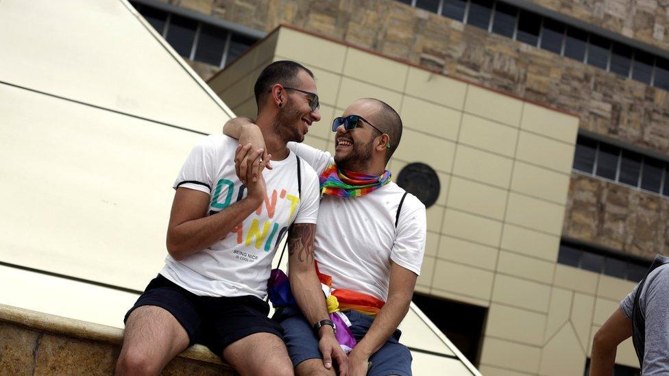 Couple outside Supreme Court