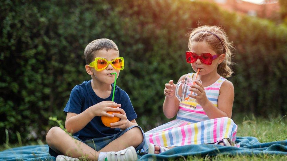 children-drinking-juice.