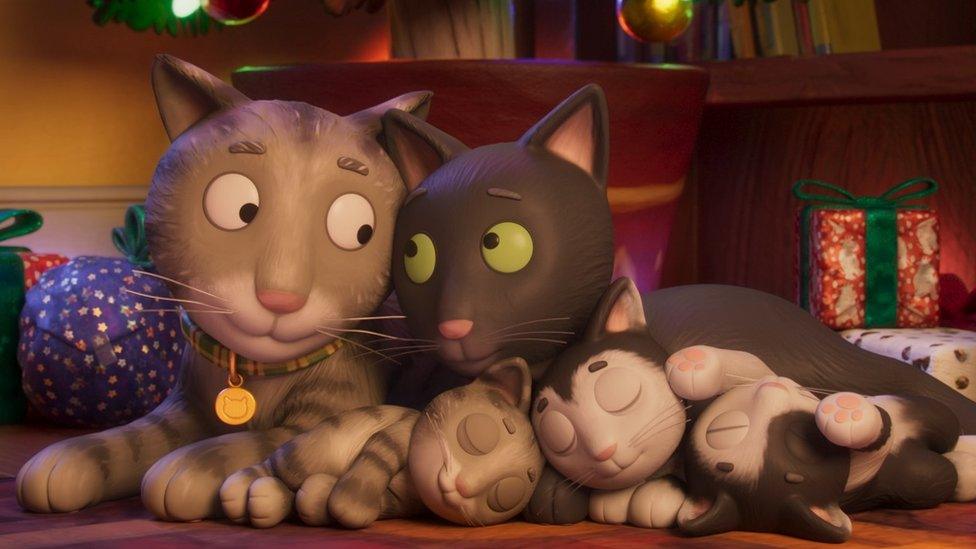 two animated cats with kittens