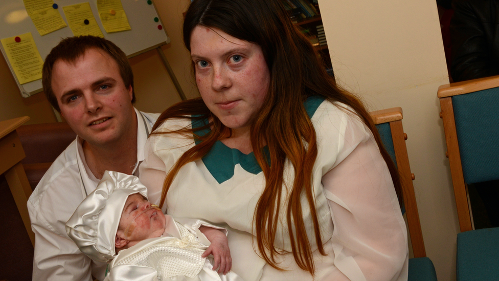 Baby Alvin with parents