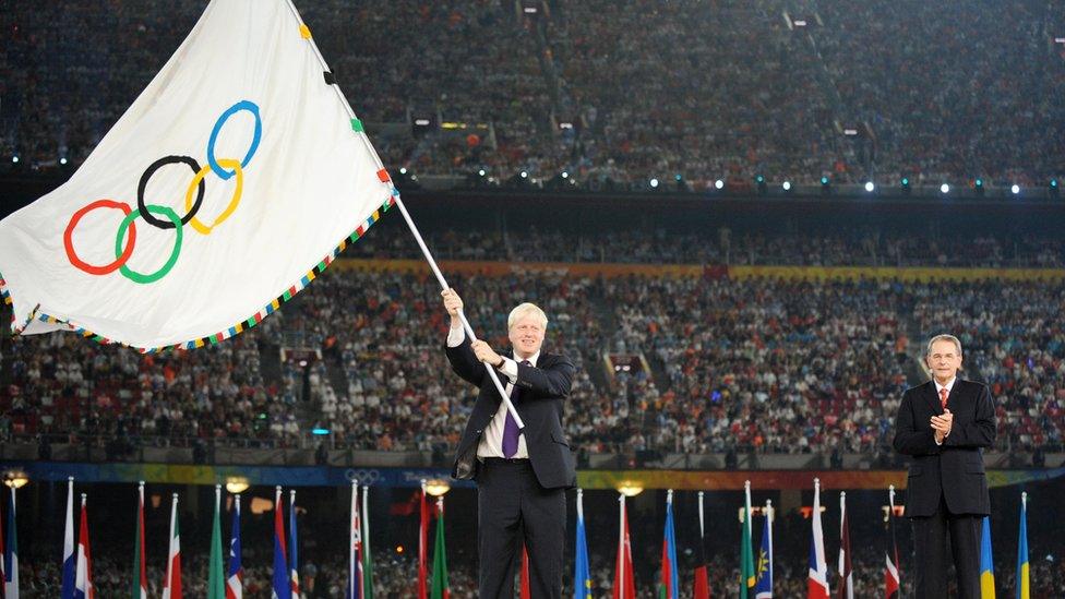 Boris Johnson waves the Olympic flag during the Beijing 2008 closing ceremony