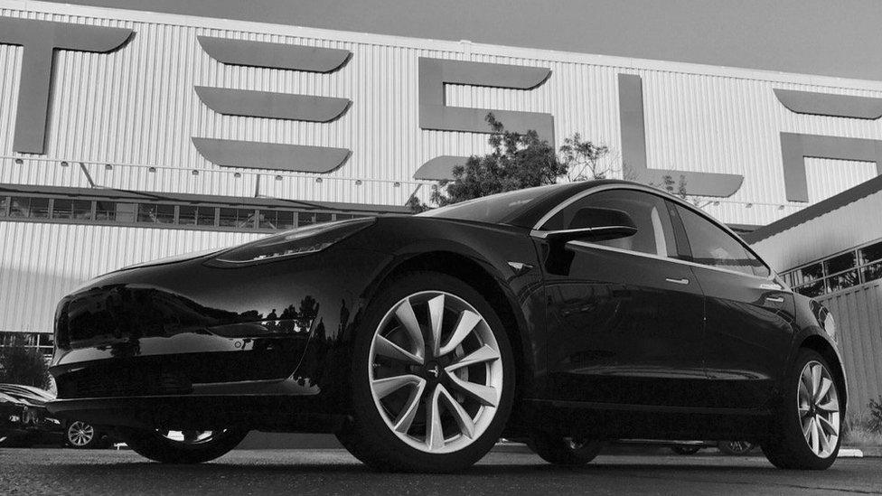 A Tesla Model 3 outside the company's factory in California