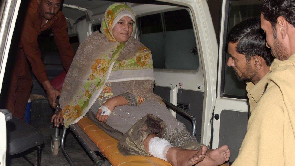 wounded woman in Pakistan Kashmir