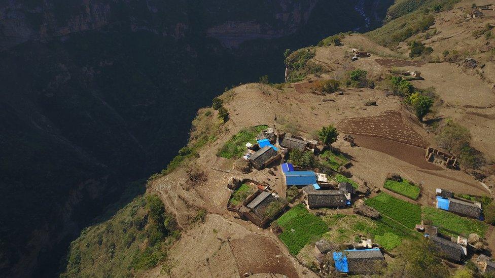 An aerial view of Atuler village on a cliff on November 11, 2016 in Zhaojue county, China