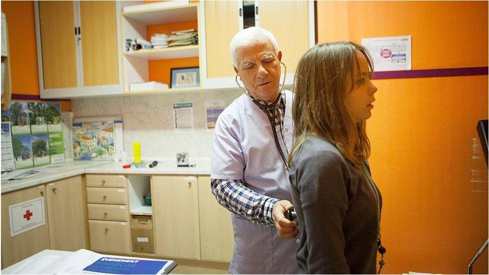 Doctor with patient in France