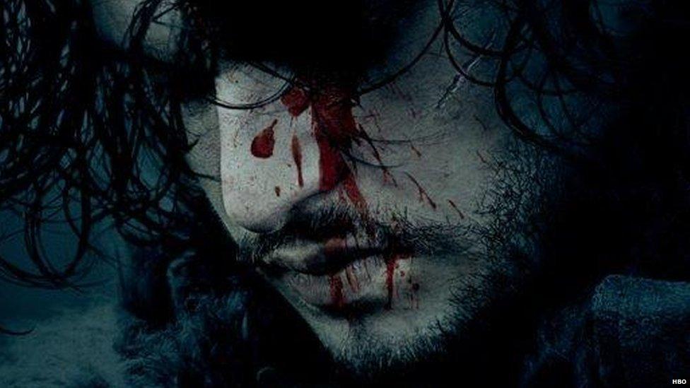 The character of Jon Snow with bloody on his face