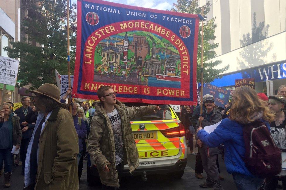 Protesters march in Preston in support of anti-fracking campaigners