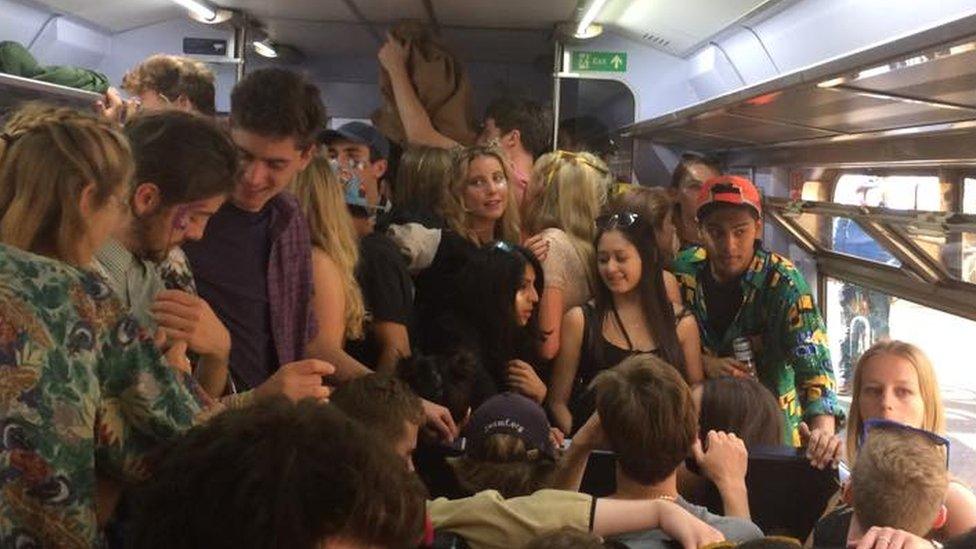 People on crowded train