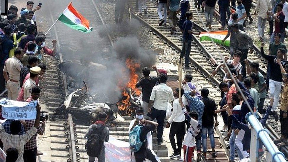 Protesters seen during a demonstration against the government's new Agnipath recruitment scheme in Secunderabad