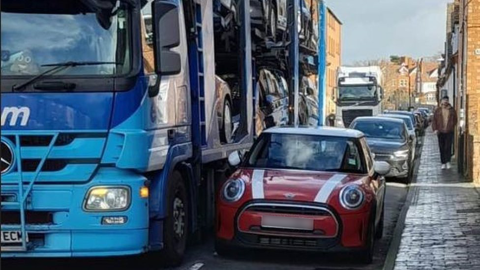 Lorry passing a car