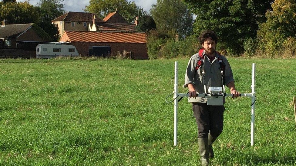 Sheffield doctoral student Pete Townend carries out geophysical and magnetometry surveys at the Little Carlton site