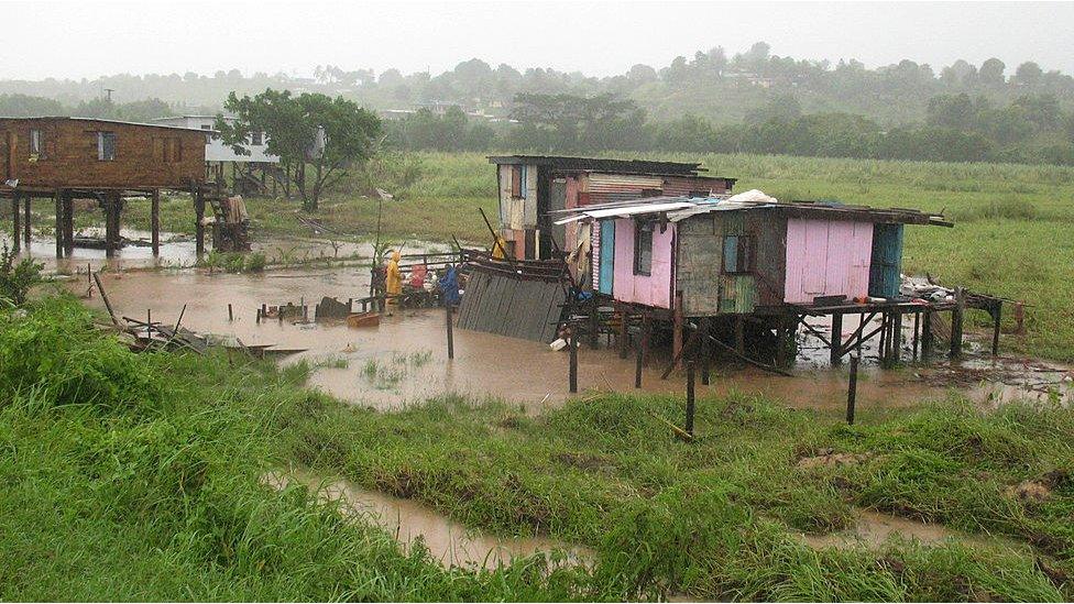 houses-on-stilts-in-floodwaters