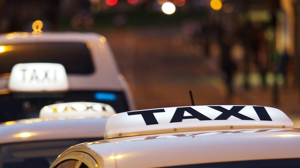 Taxi queue at night