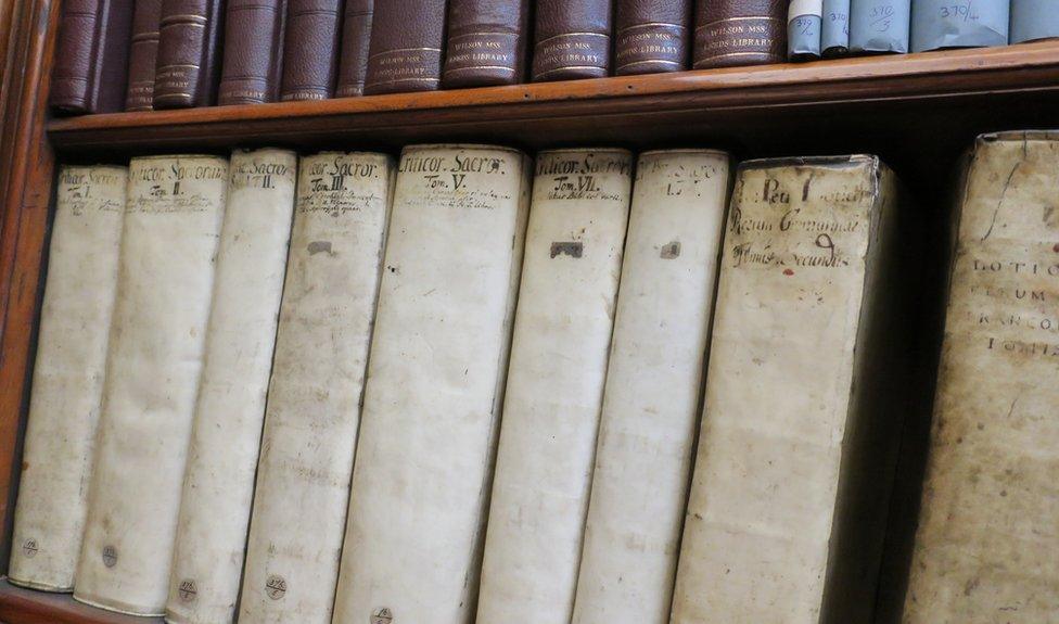 Old books on the shelves at the Leeds Library