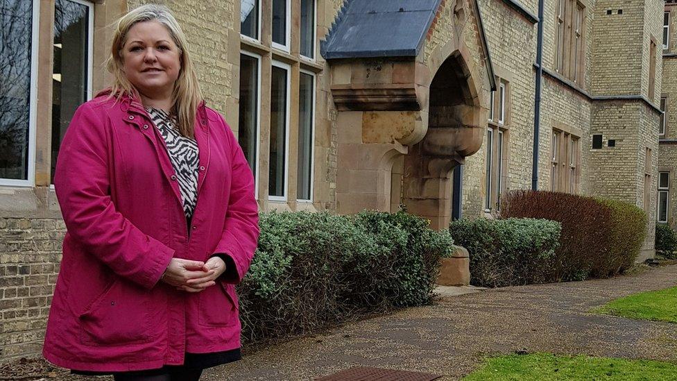 Joanna Hudson standing outside the old Victorian Asylum in Fulbourn, Cambridgeshire