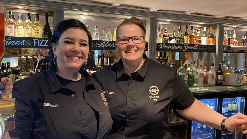 The two new managers of the Coach Inn in Lesbury, Northumberland behind the bar