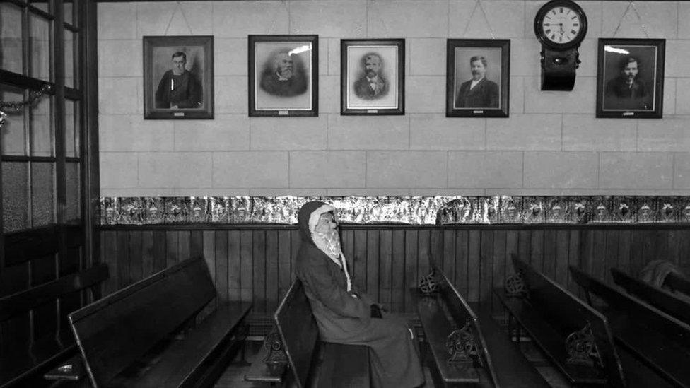 Father Christmas sitting in a church in Tudweiliog