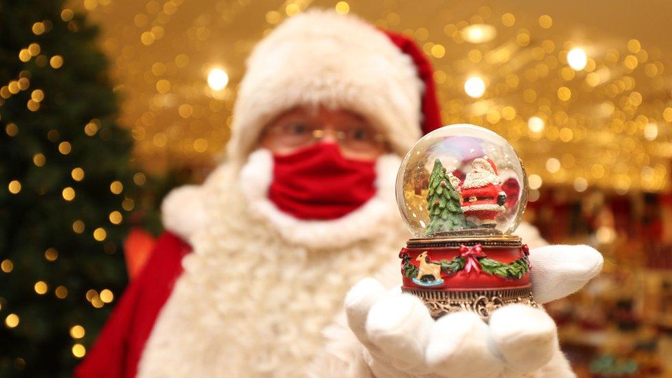 A man dressed as Father Christmas in Selfridges