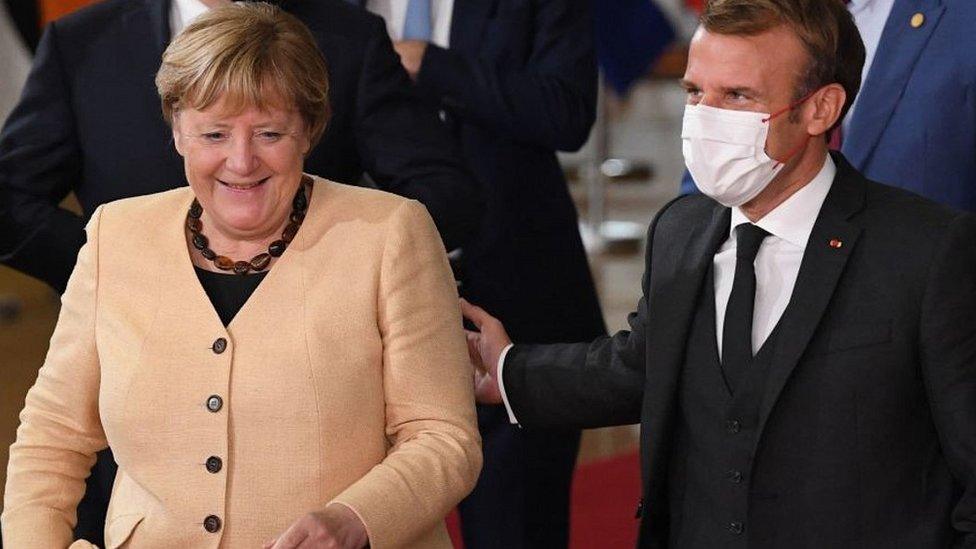 German Chancellor Angela Merkel with French President Emmanuel Macron at EU summit in Brussels, 21 Oct 21