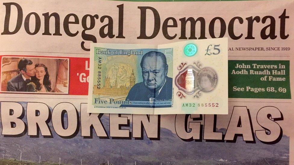 Five pound note with Donegal Democrat