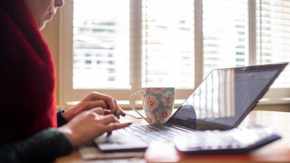 Woman using laptop