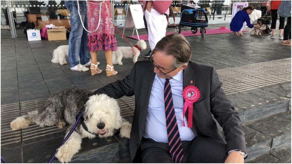 Mick Antoniw AM with one of the campaigner's dogs