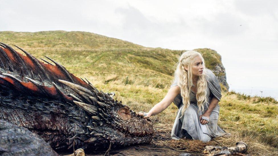 Actress Emilia Clarke appears in a scene from Game of Thrones