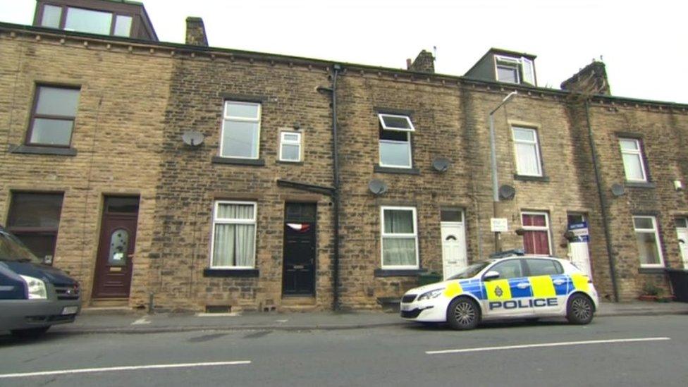 Police vehicles at scene in Parkwood Street, Keighley
