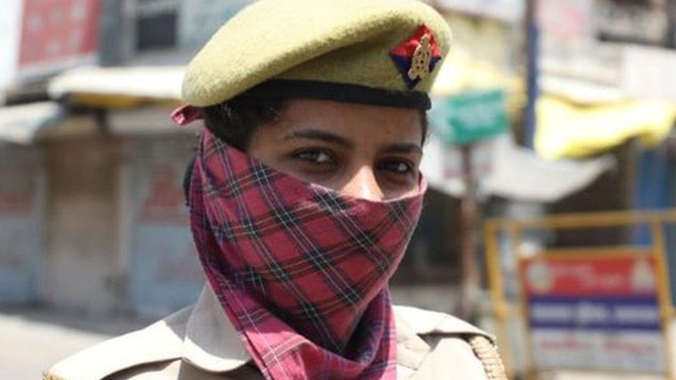 A police officer in an empty street