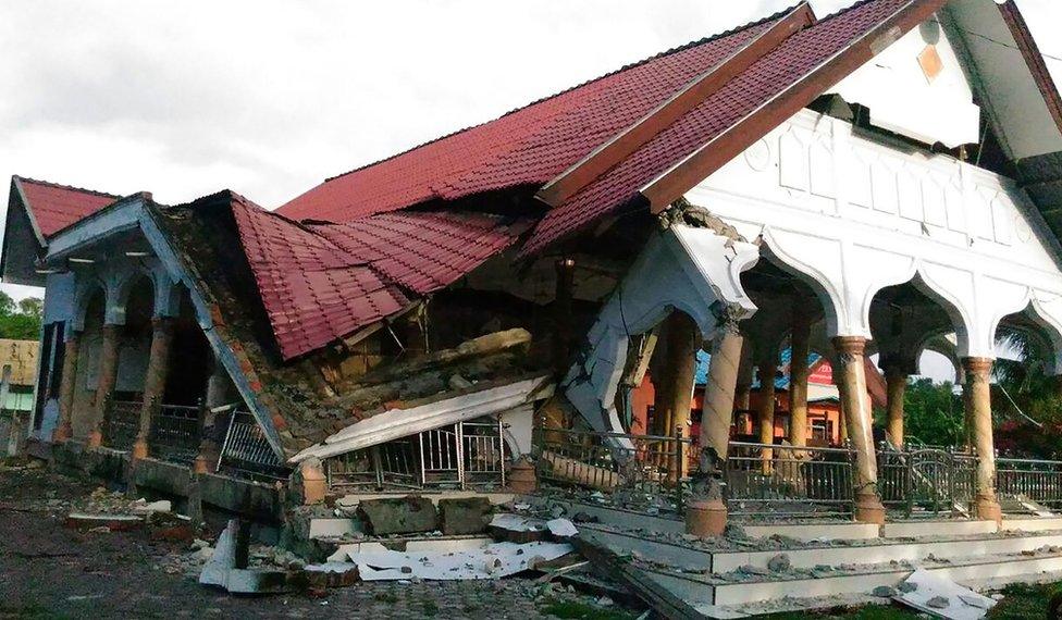 A badly damaged building is seen after a 6.5-magnitude earthquake struck the town of Pidie, Indonesia's Aceh province in northern Sumatra, on 7 December 2016.