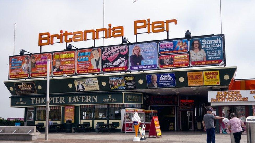 Signs at the entrance to the pier at Great Yarmouth