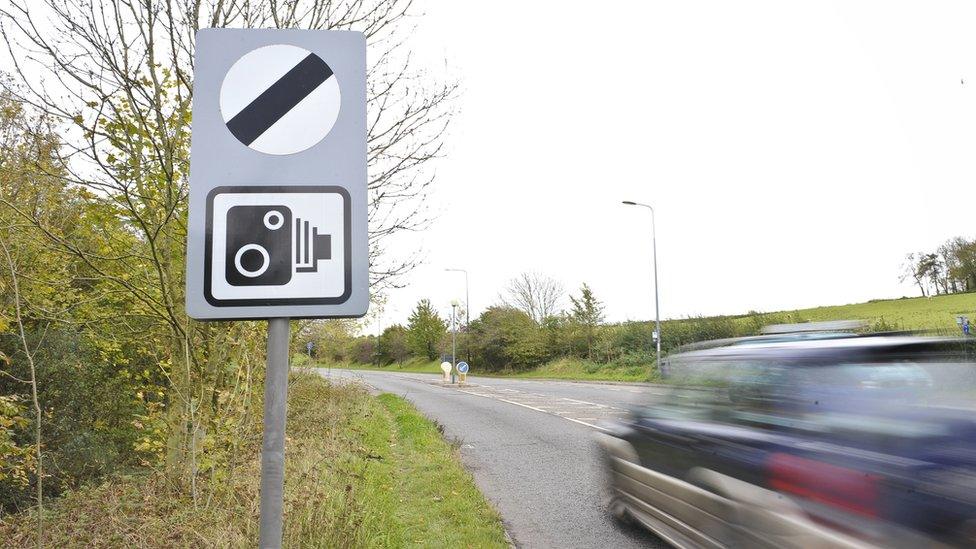 A speed camera sign